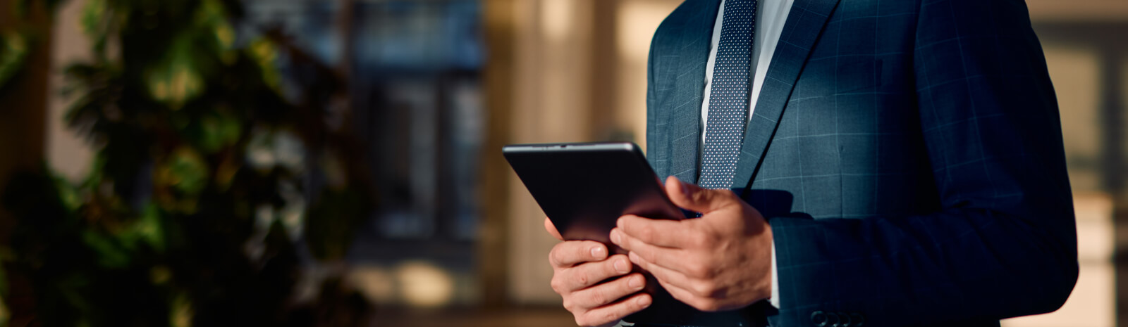 Business man holding digital tablet